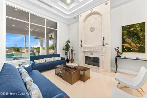 a view of a kitchen with an empty space and a window