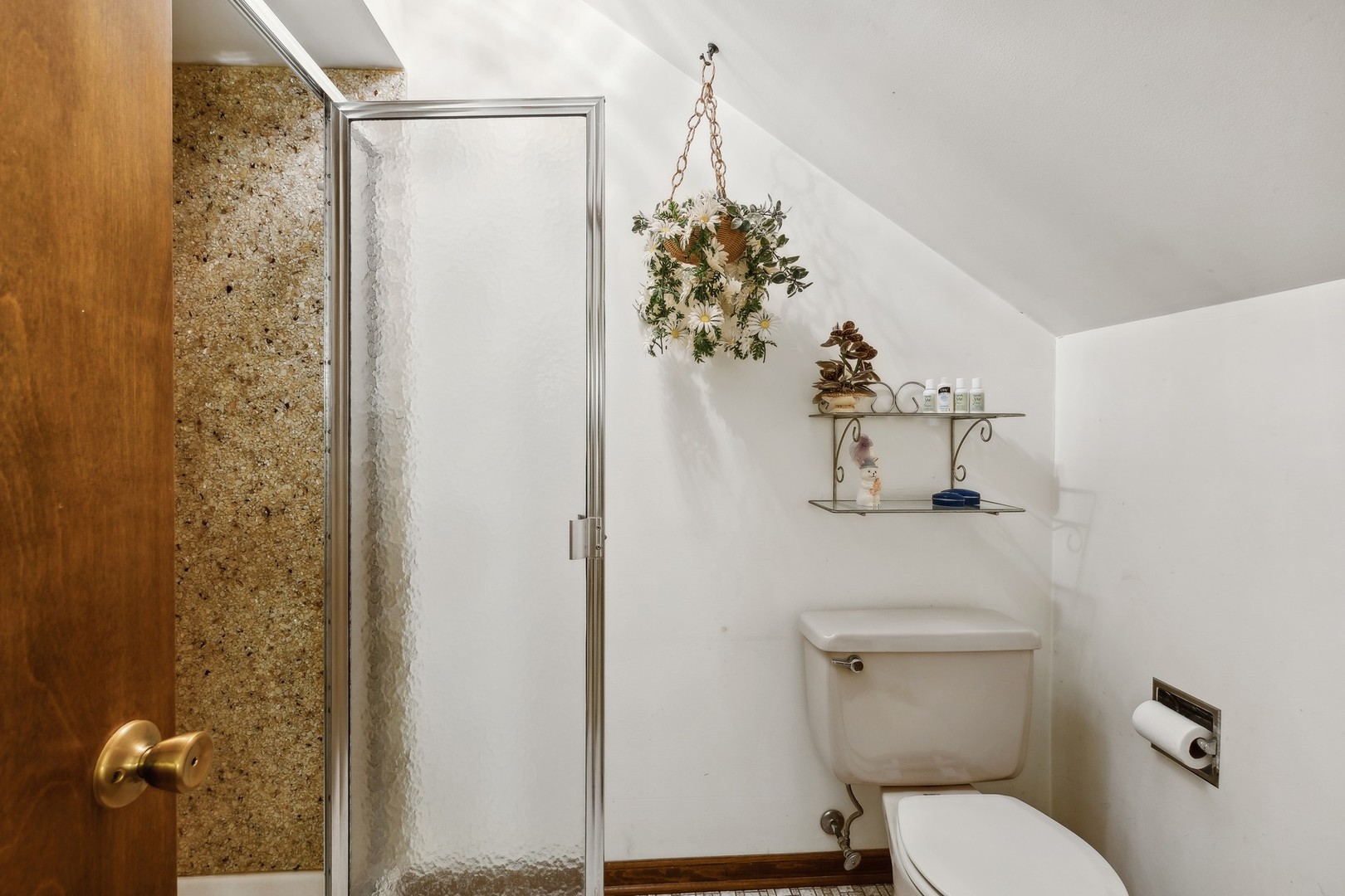 40W173 Oak Ridge Road St. Charles, IL 60175 - Photo 22 of 38 a bathroom with a toilet and shower curtain
