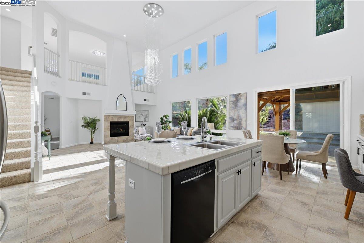 2455 Covelite Way Antioch, CA 94531 - Photo 13 of 60 a kitchen with kitchen island a sink appliances and cabinets