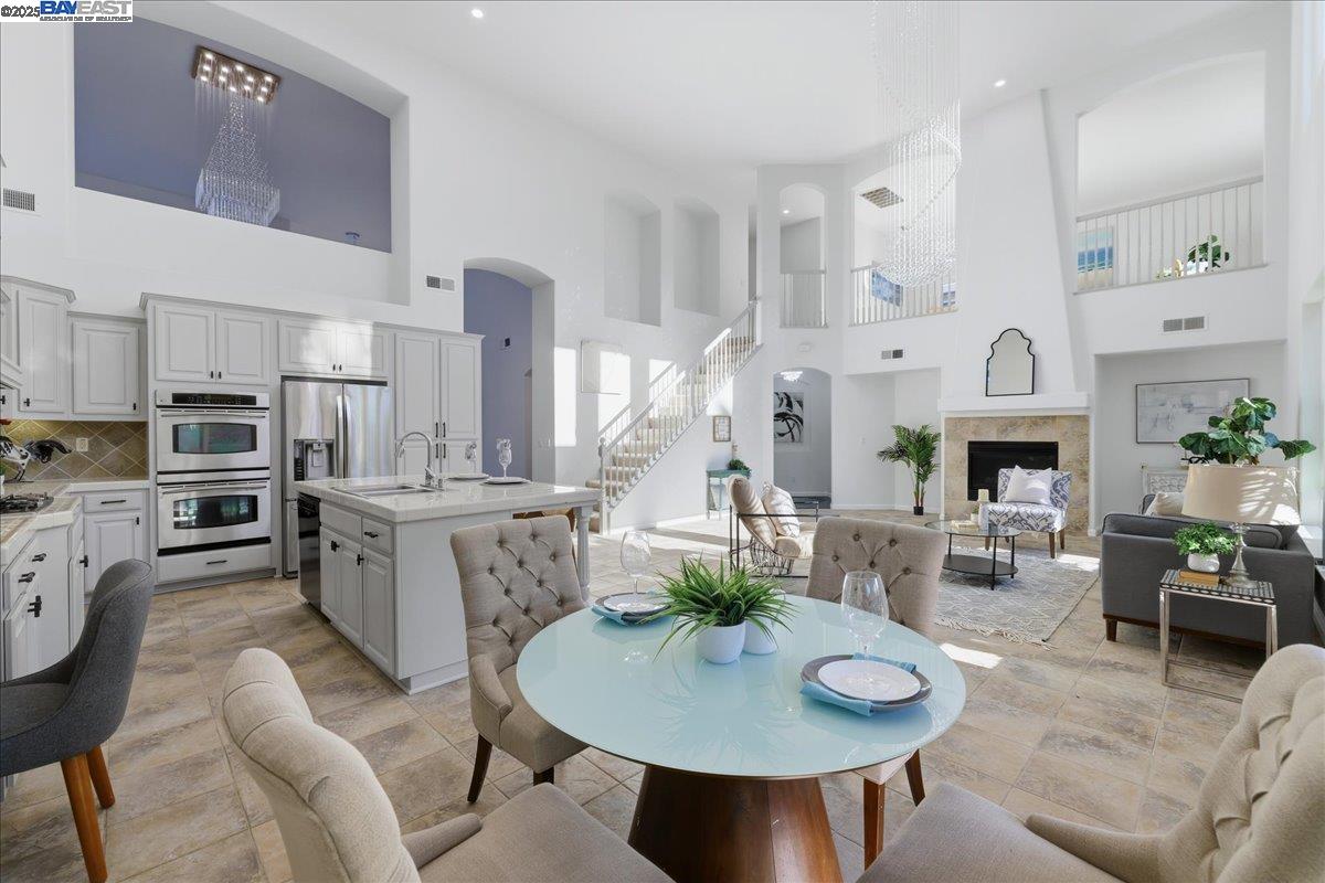 2455 Covelite Way Antioch, CA 94531 - Photo 17 of 60 a living room with fireplace furniture and a wooden floor