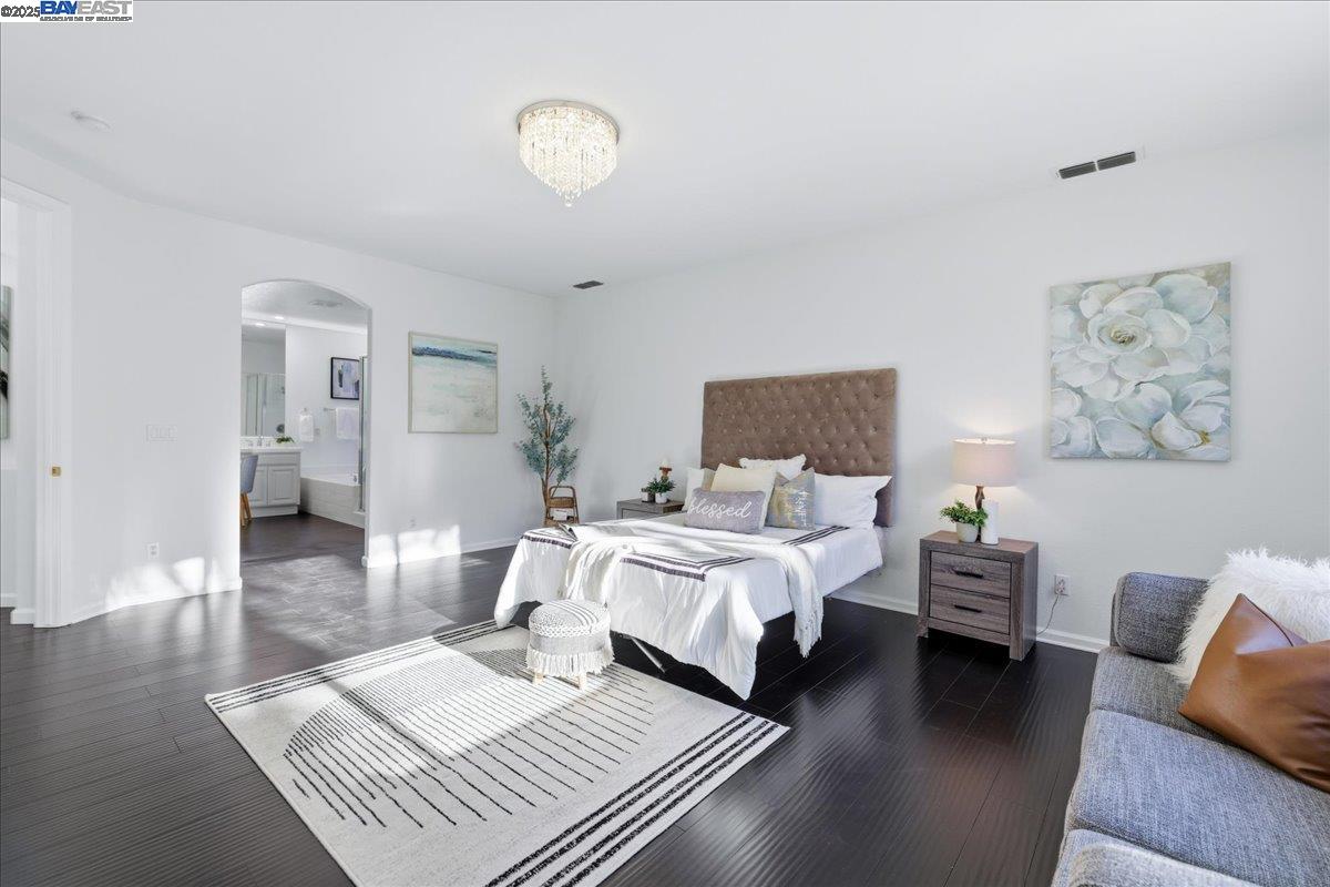 2455 Covelite Way Antioch, CA 94531 - Photo 28 of 60 a bed room with bed and a couch