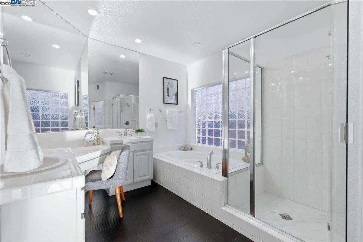 2455 Covelite Way Antioch, CA 94531 - Photo 33 of 60 a bathroom with a bathtub shower sink vanity and toilet