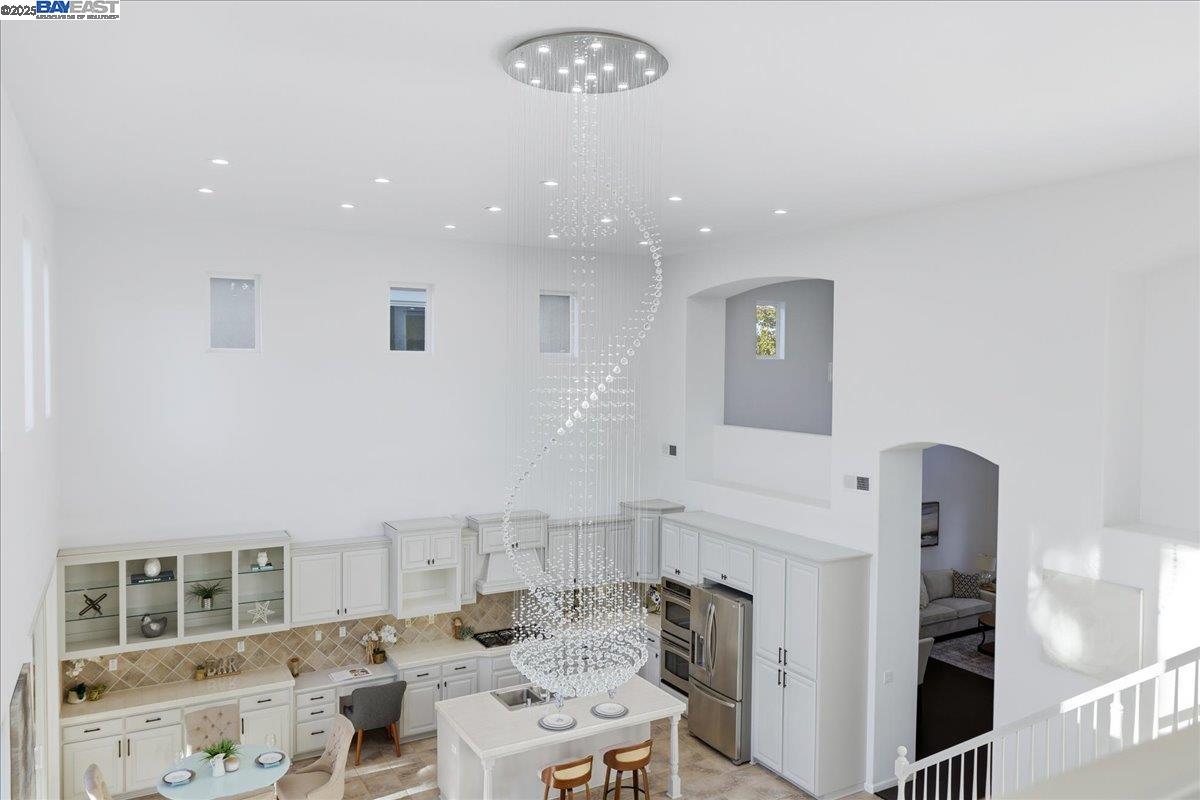 2455 Covelite Way Antioch, CA 94531 - Photo 42 of 60 a living room with furniture a fireplace and a large window