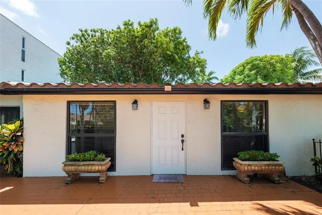 a view of a park with a tree
