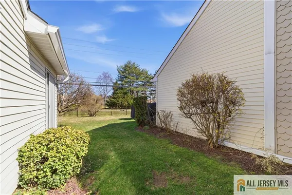 a view of a back yard of the house