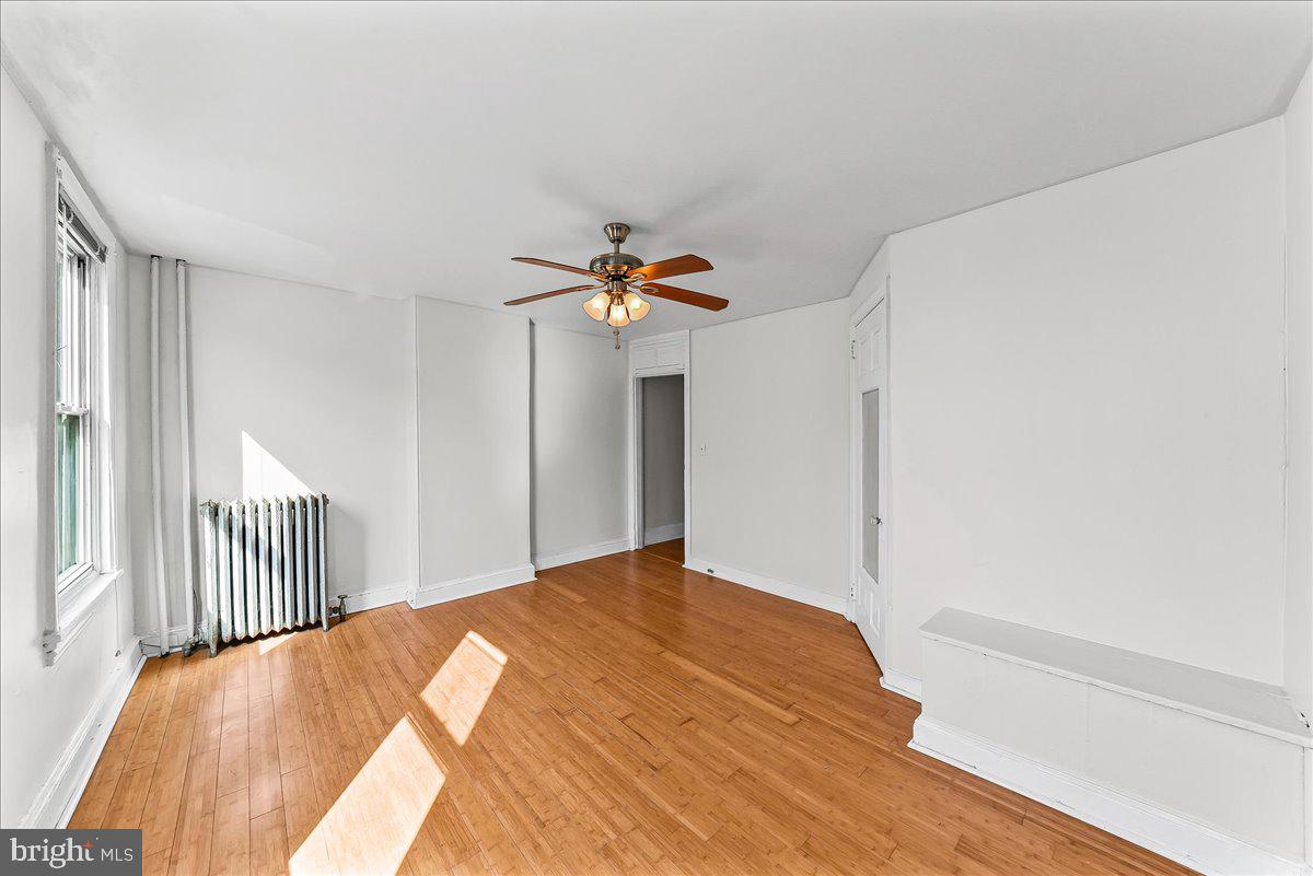 3654 Calumet Street Philadelphia, PA 19129 - Photo 22 of 33 a bedroom with a bed and a window