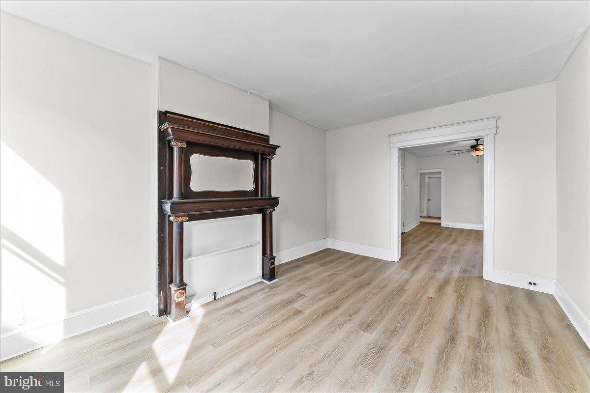 3654 Calumet Street Philadelphia, PA 19129 - Photo 6 of 33 a view of an empty room and wooden floor