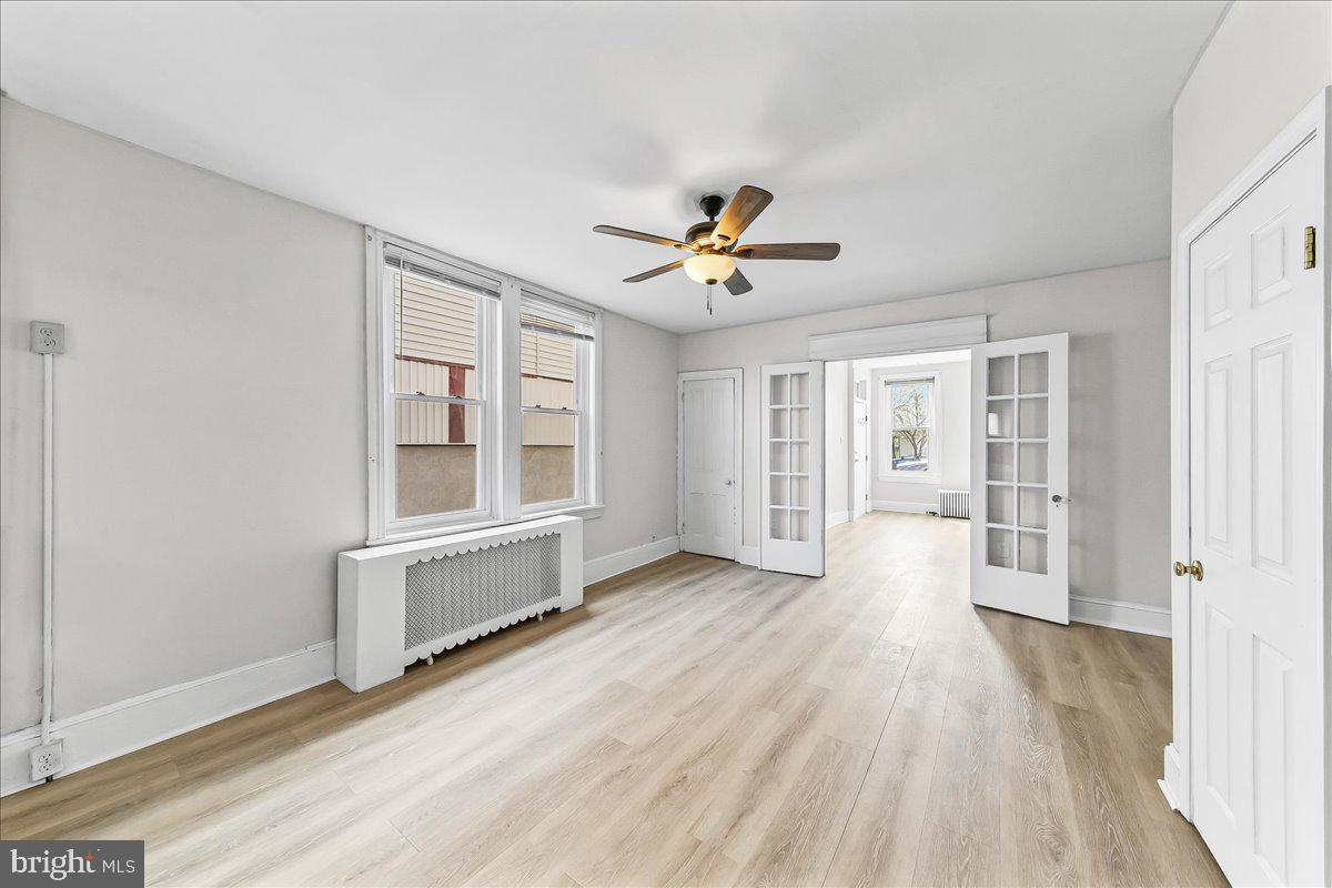 3654 Calumet Street Philadelphia, PA 19129 - Photo 8 of 33 wooden floor in an empty room with a window