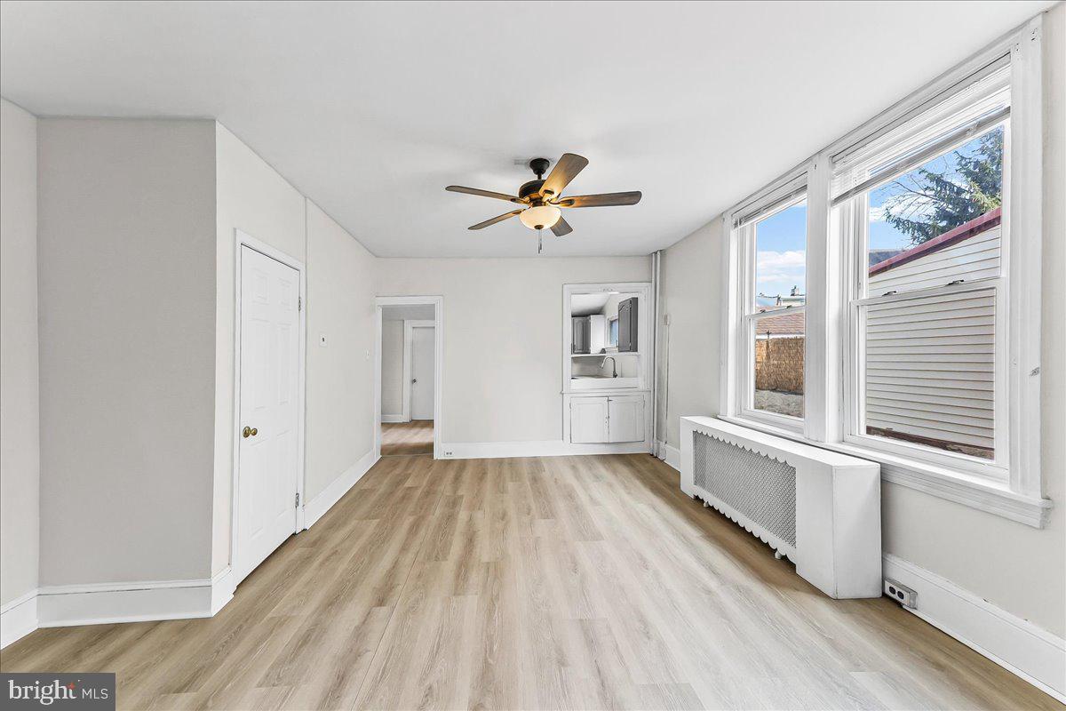 3654 Calumet Street Philadelphia, PA 19129 - Photo 9 of 33 wooden floor in an empty room with a window