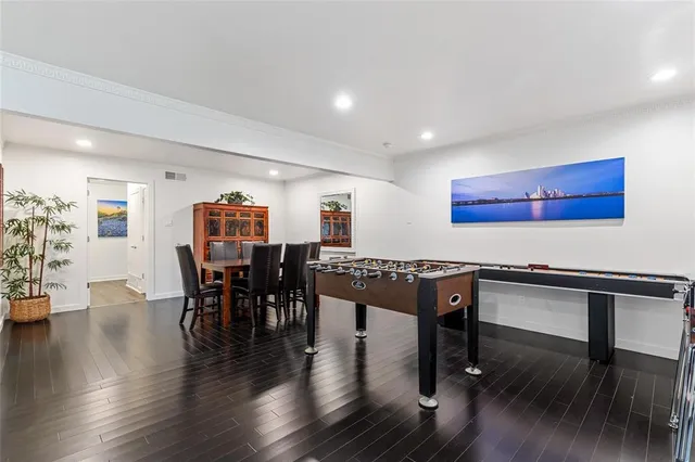 a view of a stove with wooden floor