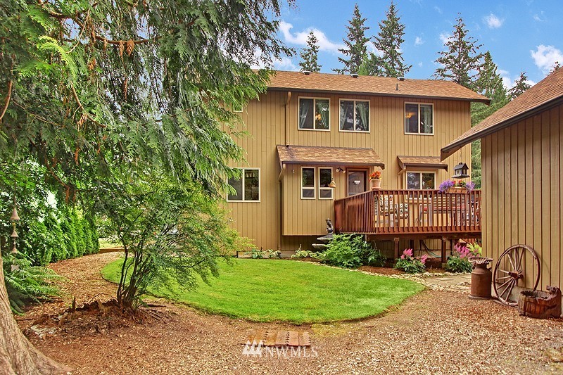 19908 4th Avenue Southeast Bothell, WA 98012 - Photo 19 of 21 a view of a house with yard and sitting area