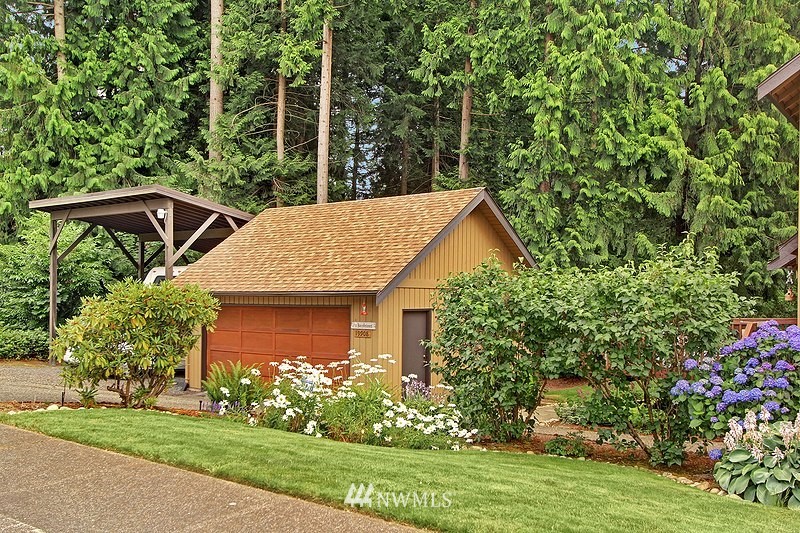 19908 4th Avenue Southeast Bothell, WA 98012 - Photo 20 of 21 a view of a house with garden