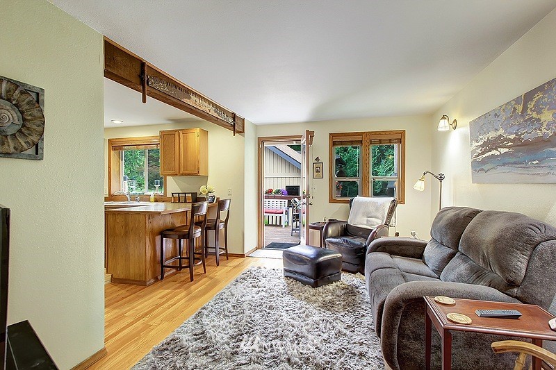 19908 4th Avenue Southeast Bothell, WA 98012 - Photo 3 of 21 a living room with furniture and a table