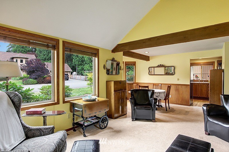19908 4th Avenue Southeast Bothell, WA 98012 - Photo 9 of 21 a living room with furniture floor to ceiling window and wooden floor