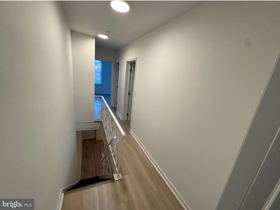 3252 Hope Street Philadelphia, PA 19140 - Photo 11 of 19 a view of entryway with wooden floor