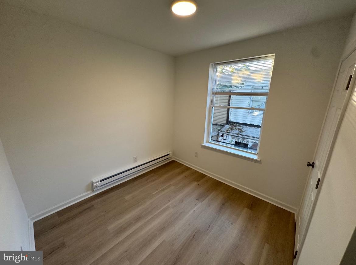 3252 Hope Street Philadelphia, PA 19140 - Photo 12 of 19 an empty room with a window