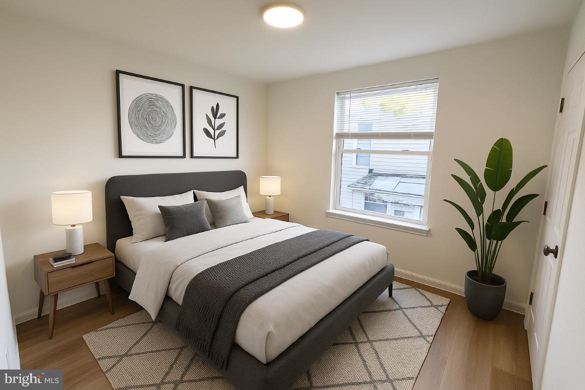 3252 Hope Street Philadelphia, PA 19140 - Photo 19 of 19 a bedroom with bed and a window