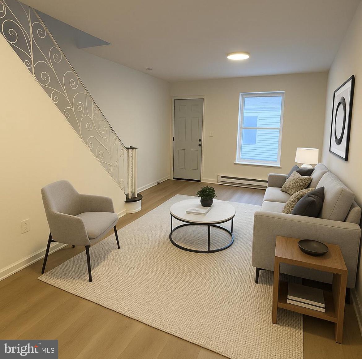 3252 Hope Street Philadelphia, PA 19140 - Photo 3 of 19 a living room with furniture and a potted plant