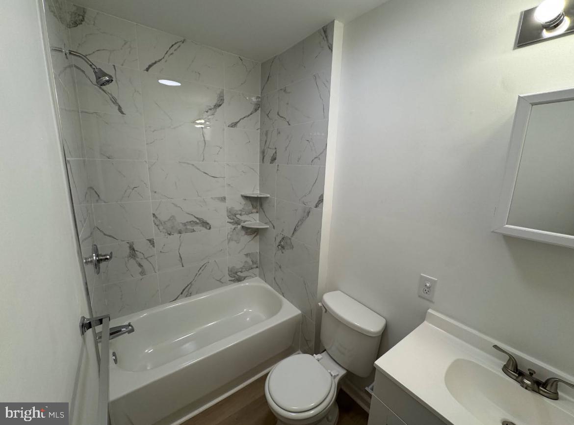 3252 Hope Street Philadelphia, PA 19140 - Photo 7 of 19 a bathroom with a sink toilet and shower