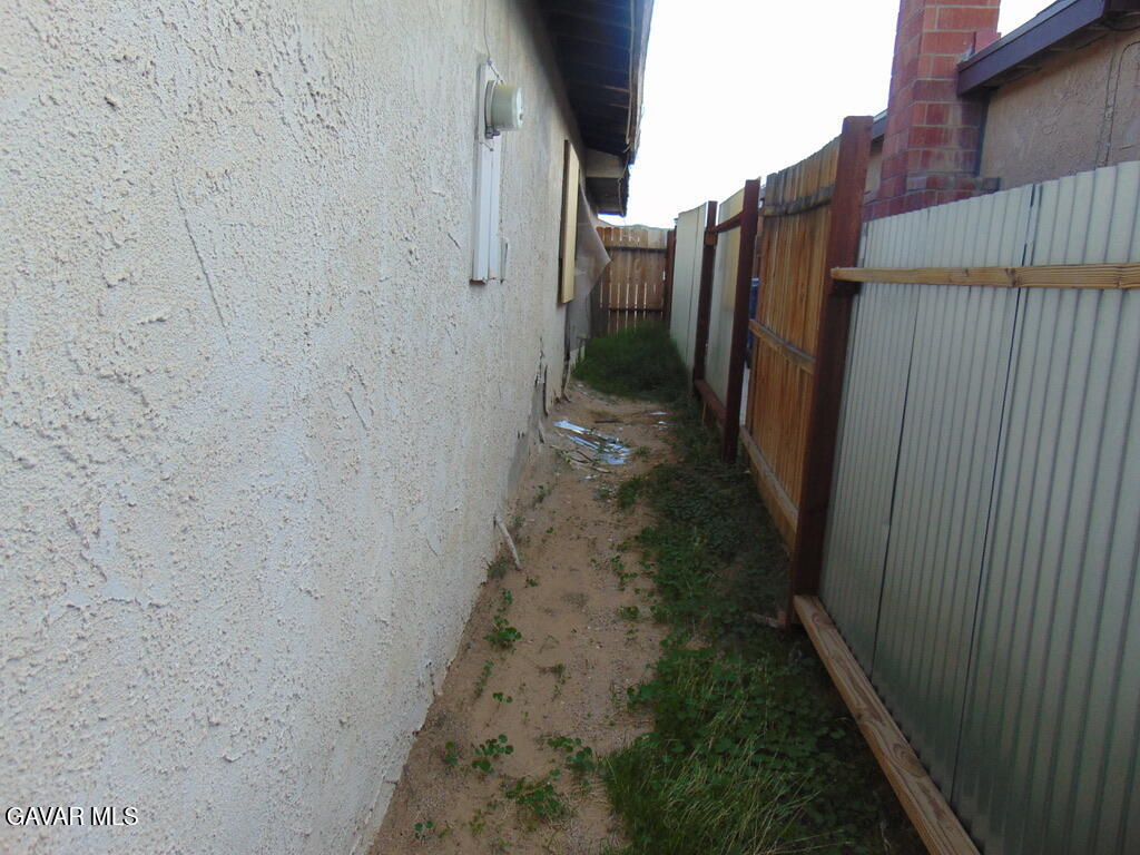 1332 West Willow Avenue Ridgecrest, CA 93555 - Photo 9 of 10 a view of a pathway of a wall