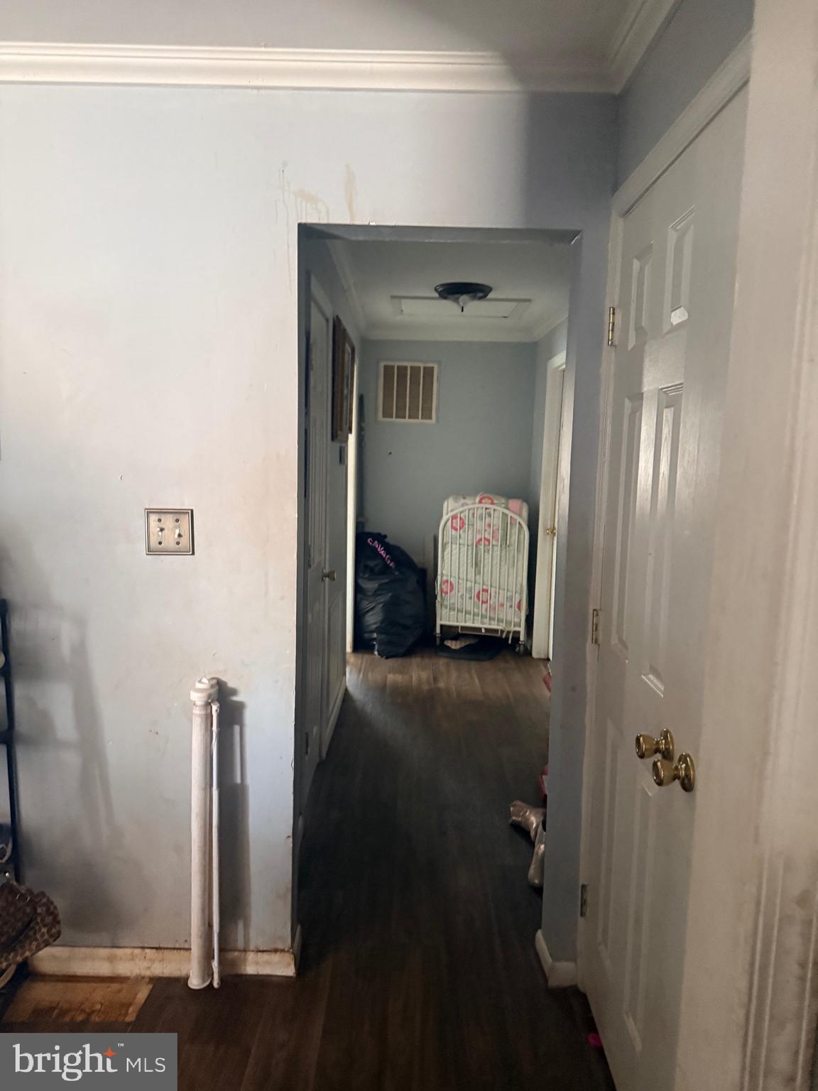 121 Elizabeth Street Culpeper, VA 22701 - Photo 15 of 22 a hallway with sliding door and wooden floor