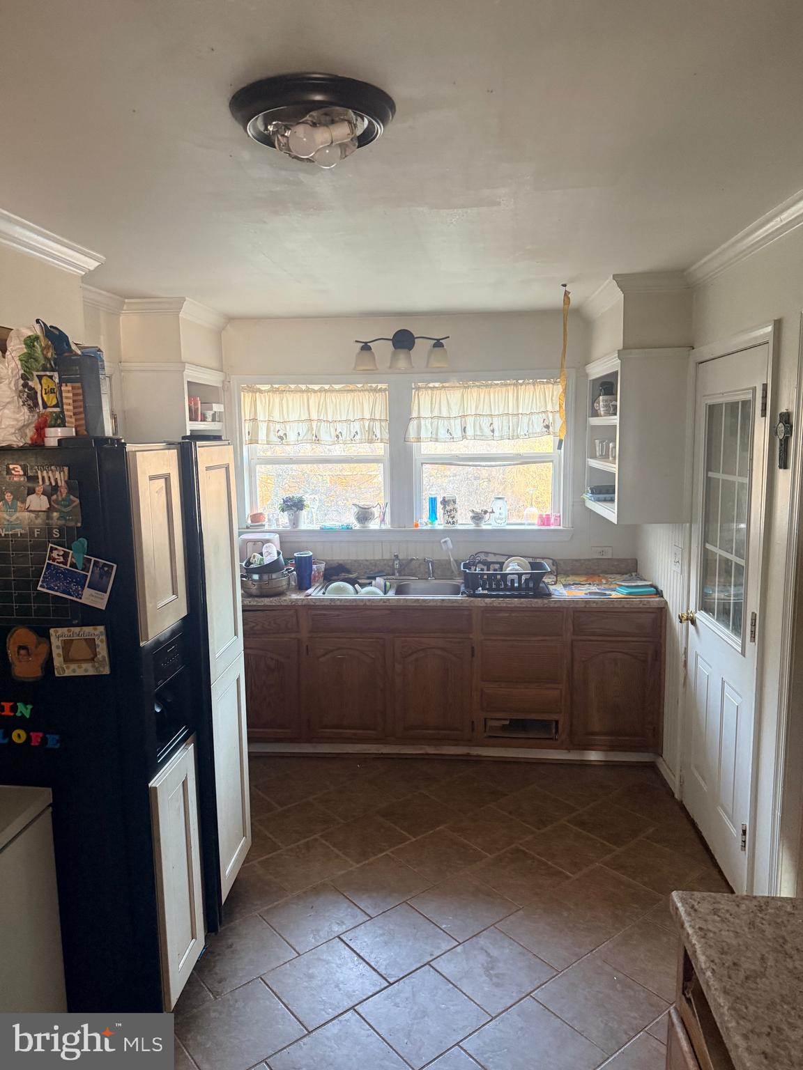 121 Elizabeth Street Culpeper, VA 22701 - Photo 16 of 22 a kitchen with stainless steel appliances a refrigerator and a stove