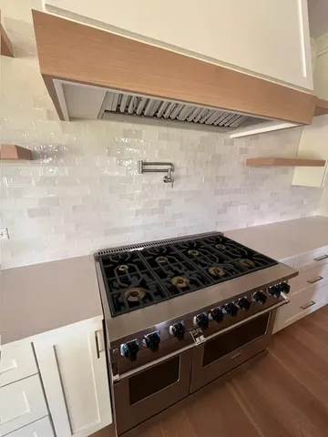 a close up of a stove top oven sitting on a counter