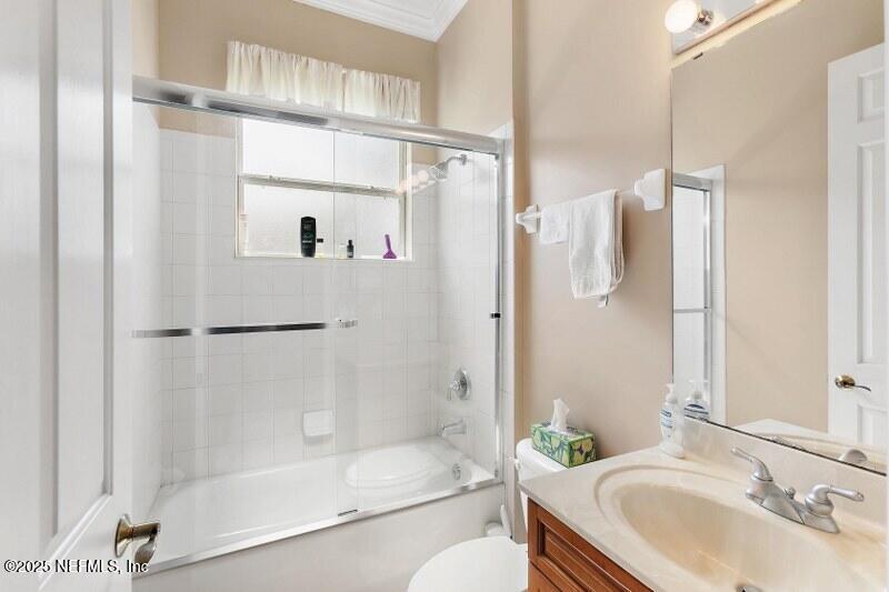 1330 Castle Pines Circle St. Augustine, FL 32092 - Photo 18 of 57 a bathroom with a sink and a mirror