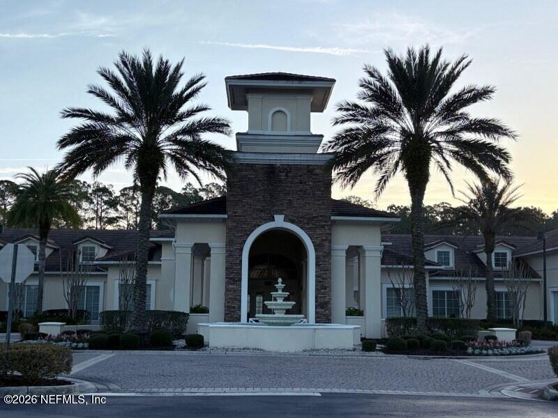 1330 Castle Pines Circle St. Augustine, FL 32092 - Photo 26 of 57 a front view of a house with a garden