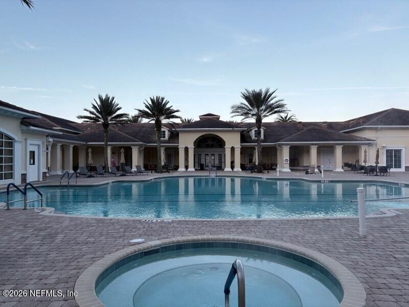 1330 Castle Pines Circle St. Augustine, FL 32092 - Photo 43 of 57 a front view of a house with a lake view