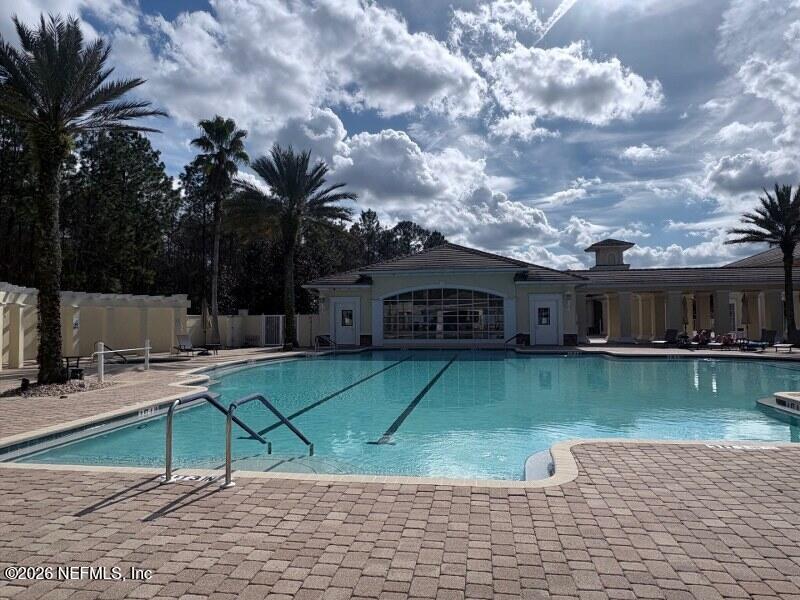 1330 Castle Pines Circle St. Augustine, FL 32092 - Photo 45 of 57 a front view of a house with garden