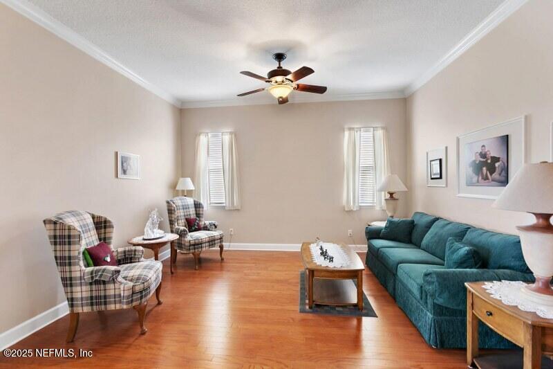 1330 Castle Pines Circle St. Augustine, FL 32092 - Photo 6 of 57 a living room with furniture and a large window