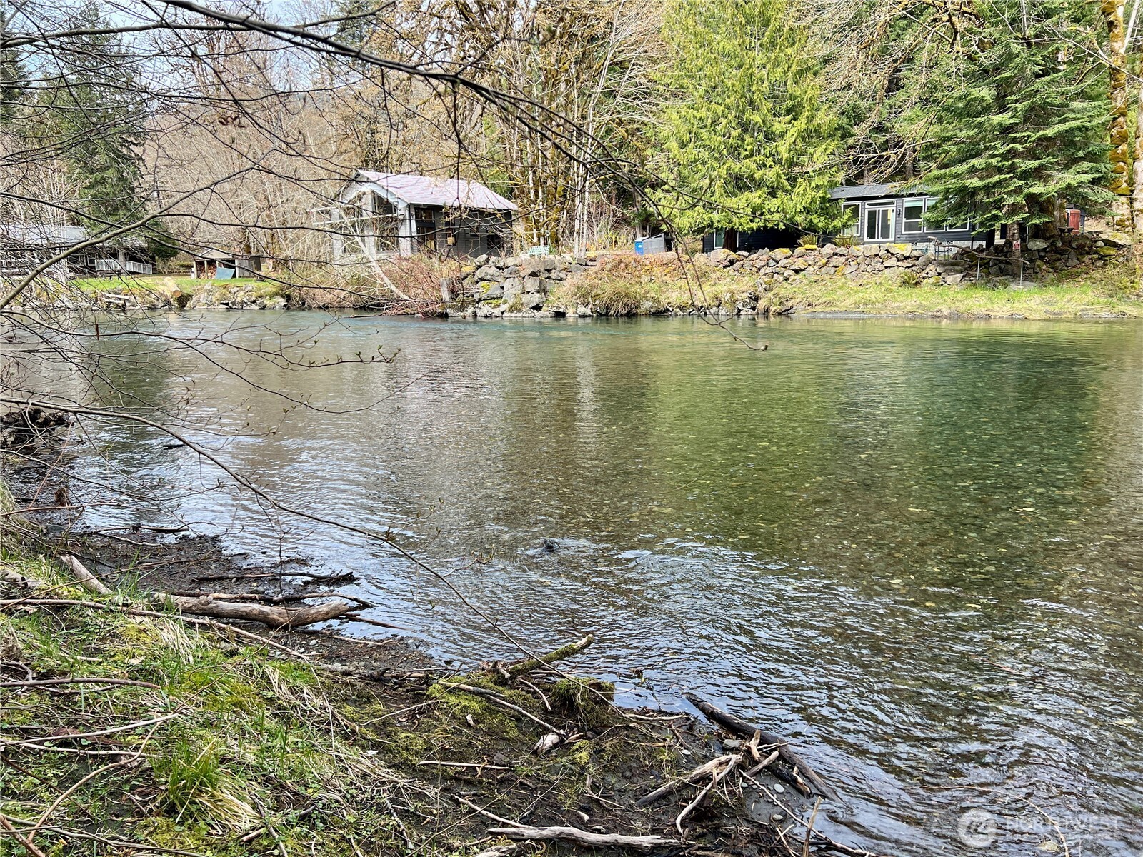 680 Mountain Trail Road Brinnon, WA 98320 - Photo 3 of 13 a view of a lake with houses