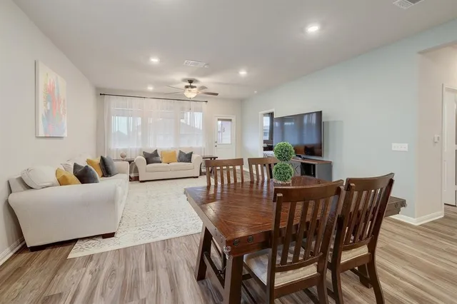 a view of a dining room with furniture