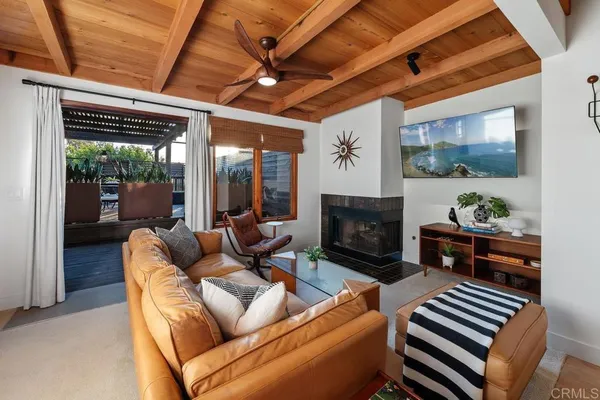 a kitchen with stainless steel appliances granite countertop a refrigerator a stove and a sink with wooden floor