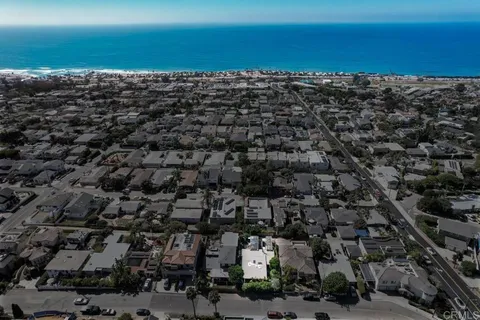 an aerial view of a city with lots of residential buildings