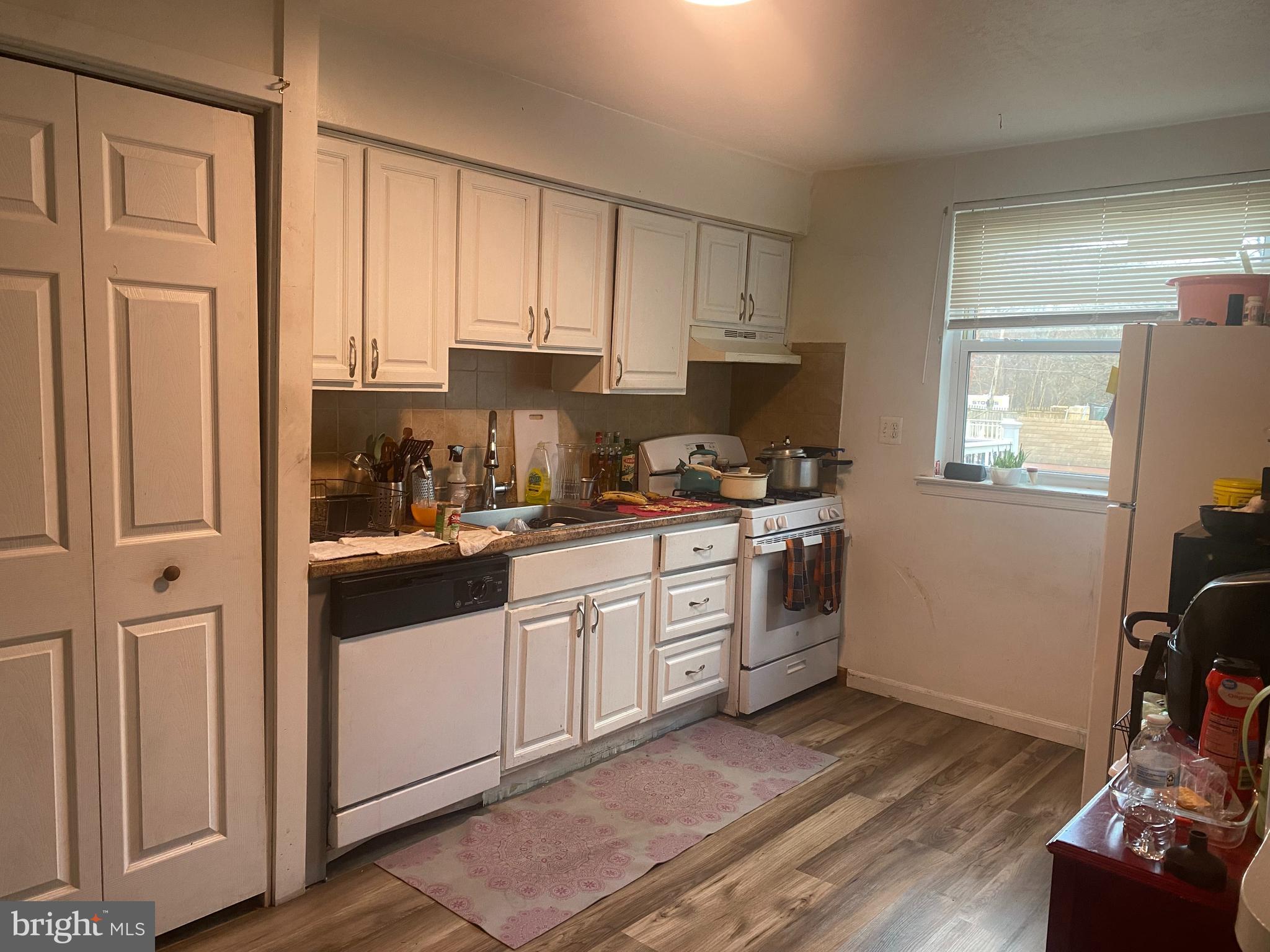 2839 Tremont Street Philadelphia, PA 19136 - Photo 5 of 14 a kitchen with a refrigerator and window