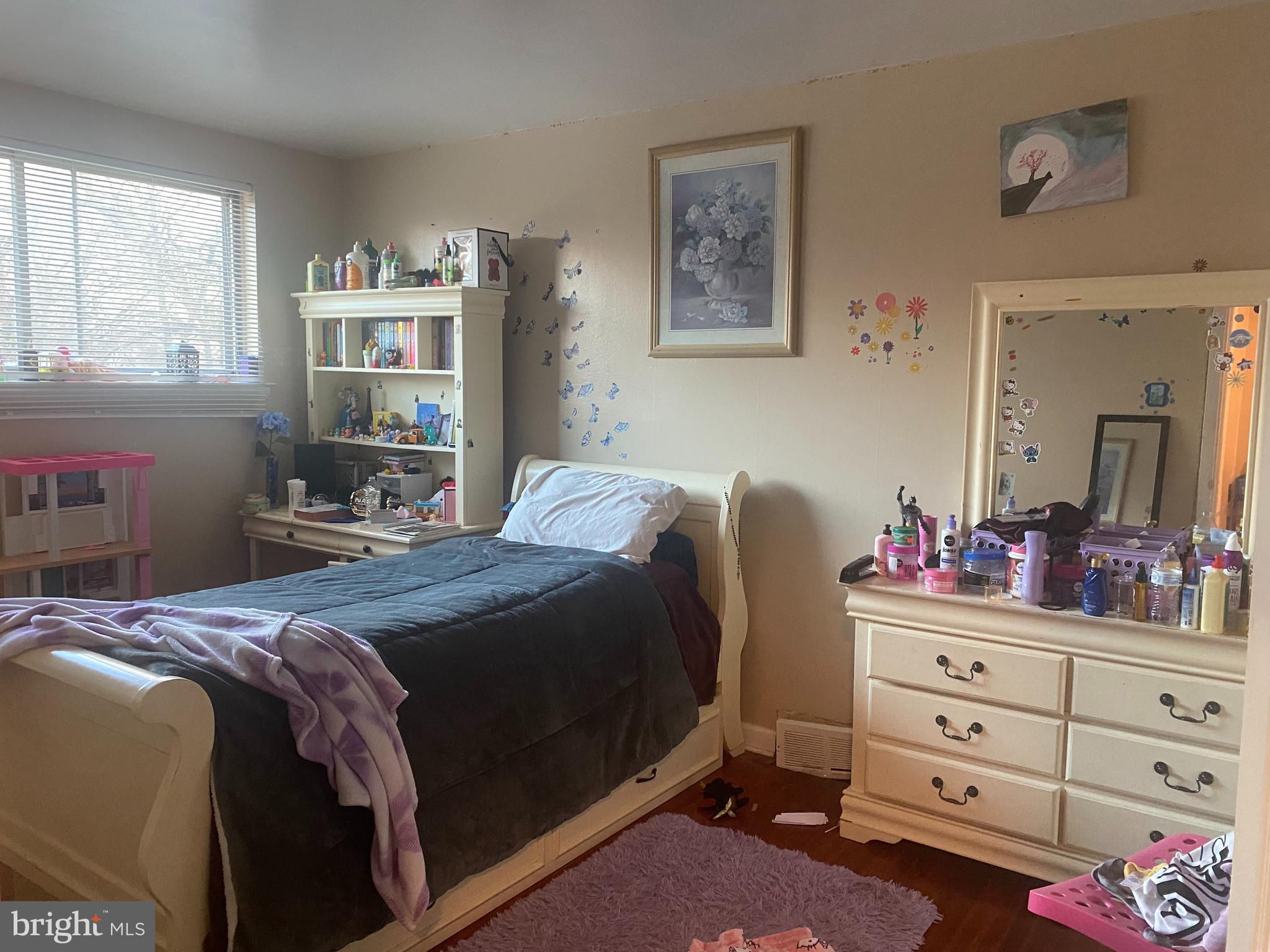 2839 Tremont Street Philadelphia, PA 19136 - Photo 8 of 14 a bedroom with a bed and a dresser