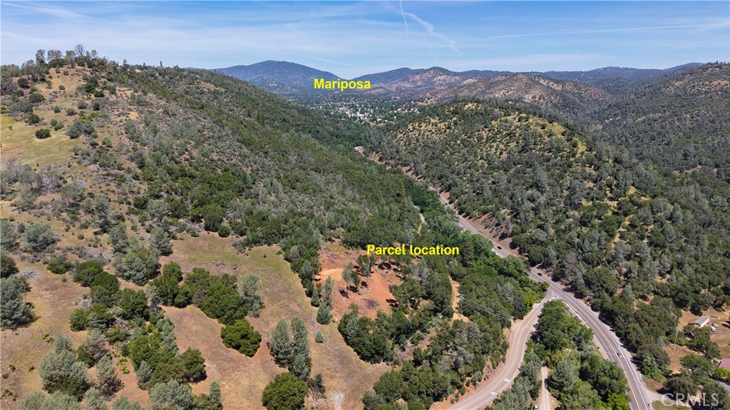 10 Miller Road Mariposa, CA 95338 - Photo 3 of 34 an aerial view of mountain with residential house and green space