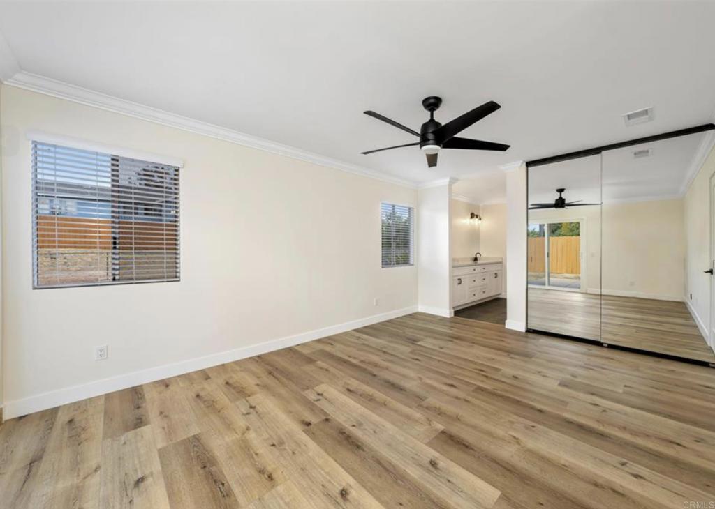 748 Cholla Road Chula Vista, CA 91910 - Photo 14 of 20 a view of a livingroom with a ceiling fan and a window