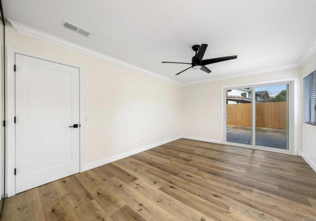 748 Cholla Road Chula Vista, CA 91910 - Photo 15 of 20 a view of empty room with wooden floor and ceiling fan