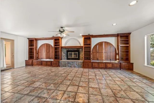 a view of an entryway with wooden floor and door