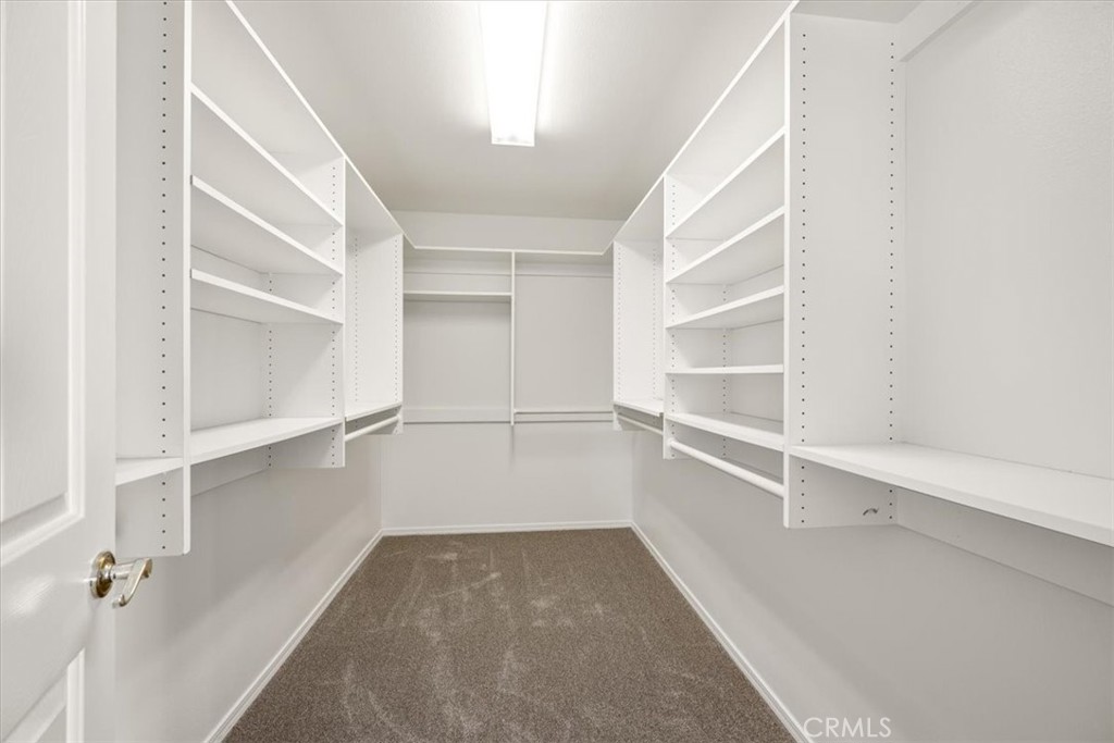 765 Ridgemont Way Arroyo Grande, CA 93420 - Photo 18 of 45 a view of walk in closet with empty racks