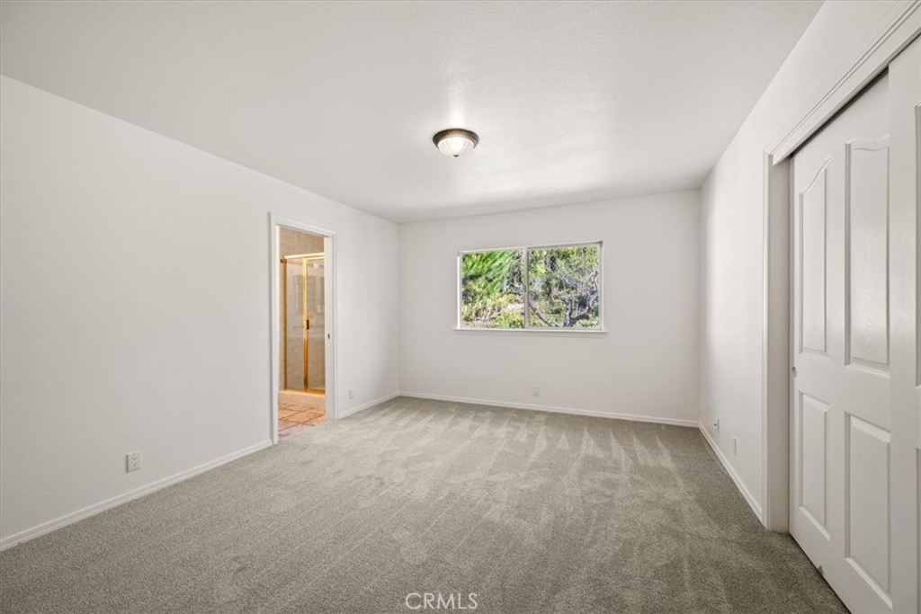 765 Ridgemont Way Arroyo Grande, CA 93420 - Photo 20 of 45 an empty room with windows