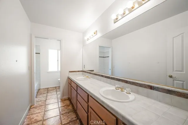 a bathroom with a toilet a sink and a bathtub