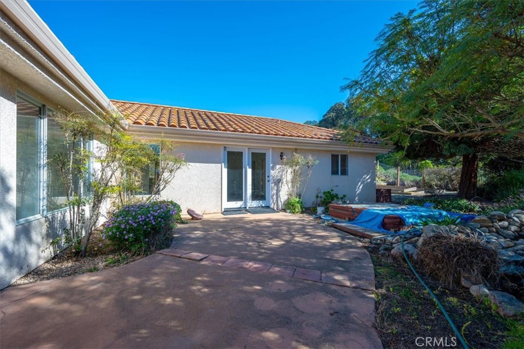 765 Ridgemont Way Arroyo Grande, CA 93420 - Photo 27 of 45 a front view of a house with garden and porch