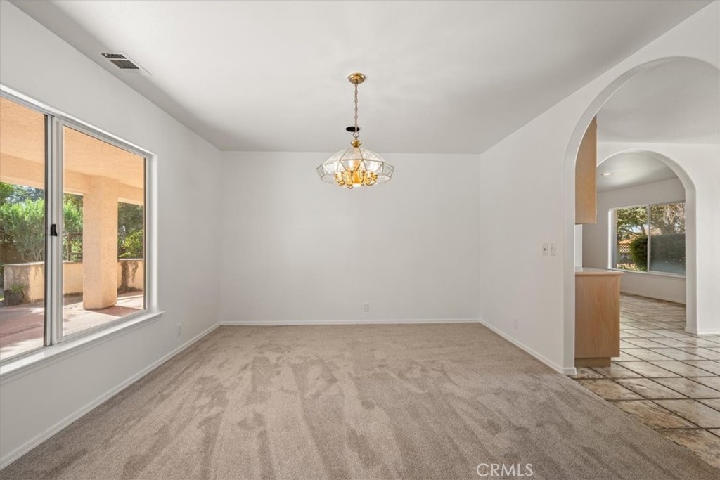 765 Ridgemont Way Arroyo Grande, CA 93420 - Photo 7 of 45 a view of an empty room with window