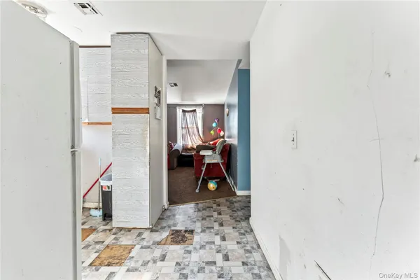 a room with sink a washer and dryer