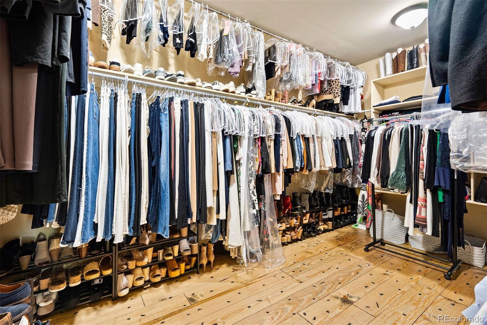 610 Clear Creek Road Evergreen, CO 80439 - Photo 22 of 50 a view of walk in closet with clothes and shoes