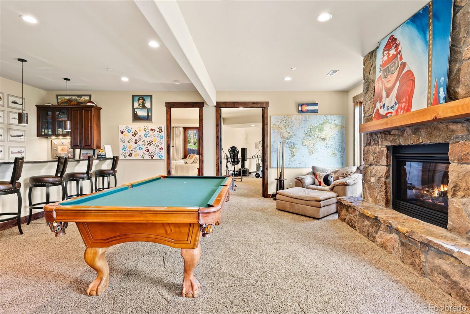 610 Clear Creek Road Evergreen, CO 80439 - Photo 28 of 50 a room with furniture pool table and flat screen tv